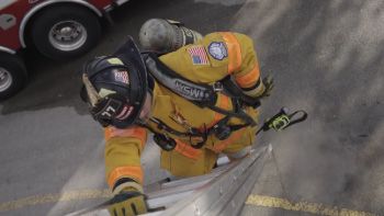 Firefighter with APX NEXT XN radio