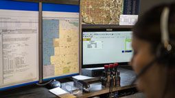 Dispatcher looking at CommandCentral Aware maps on screen