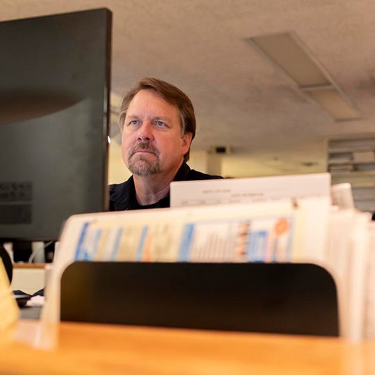 Officer working on computer