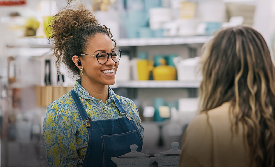 Image of female store clerk interfacing with a female customer