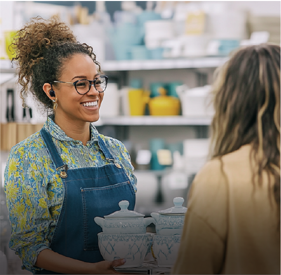 Image of female store clerk interfacing with a female customer